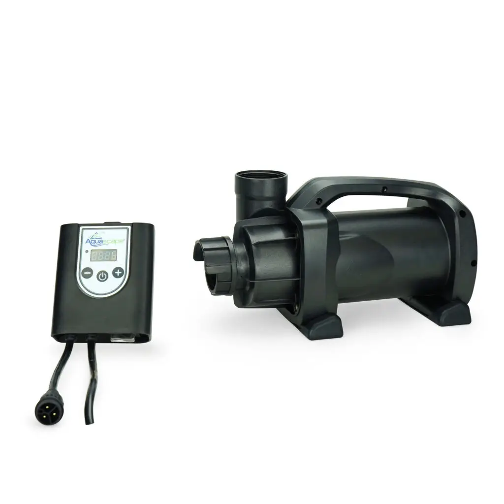 A high-performance Aquascape pump for water features, displayed alongside its electronic control panel. The sturdy black pump is designed for durability, with a large handle for easy transport and fittings for secure installation. The control panel features a digital display and buttons for adjusting the flow settings, enabling precise control over water movement for ponds, fountains, or waterfalls.